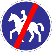 Dopravná značka - koniec cestičky pre jazdcov na koňoch